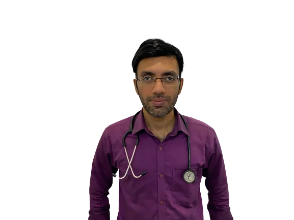 Male doctor in purple shirt and glasses with a stethoscope around his neck.