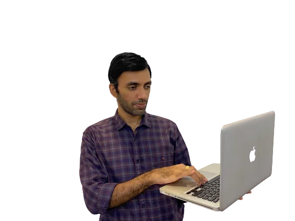 photo of dr prasoon holding a laptop